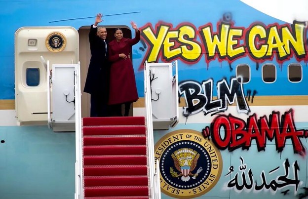 Video capture of Barack and Michelle Obama standing on the stairs by a graffiti-covered Air Force One, including Arabic writing.
