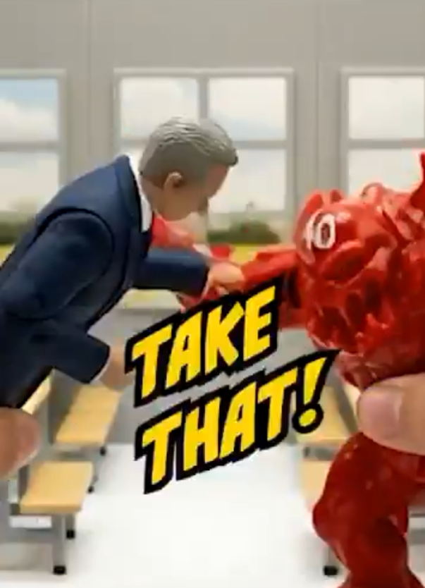 RFK action figure fighting a red food dye.